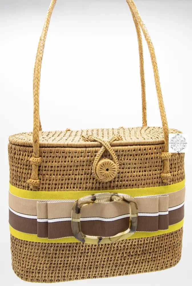 Ata decorated bag with ribbon and buckle with straw handles