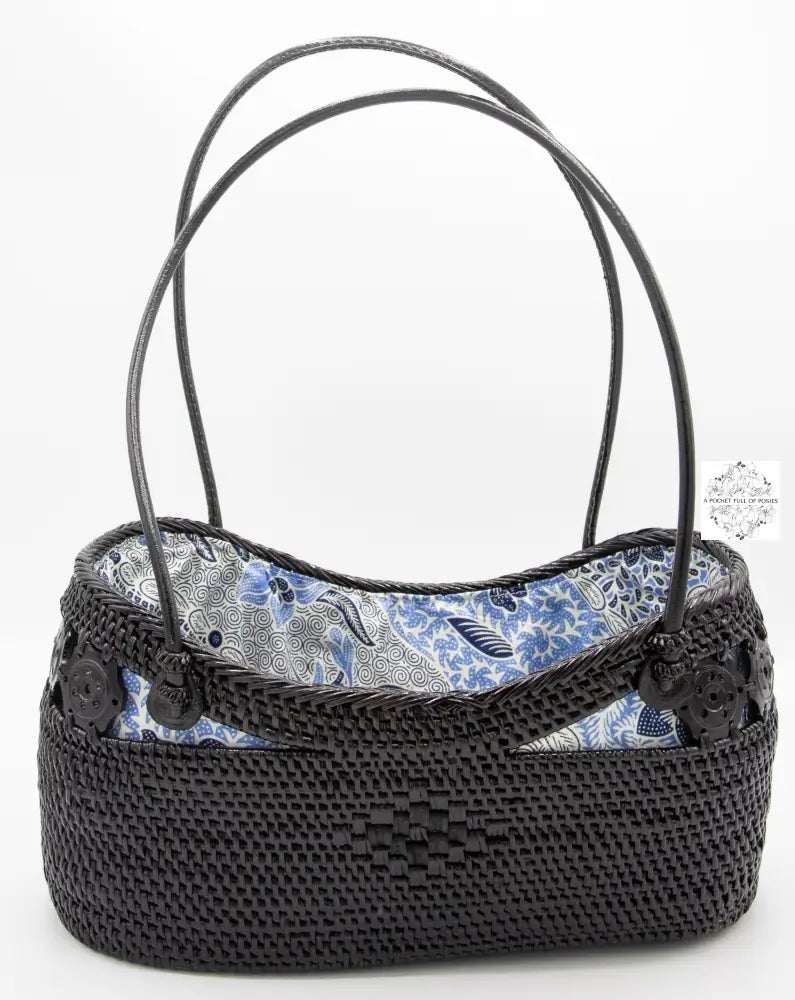 Black boat bag with top handles, blue-white drawstring lining